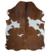 Brown and White cowhide rug, 4' x 3', shown on white background (SS-BRW-035)