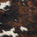 Tricolor Mini Cowhide, showing a mix of black and brown, with a few white spots (MINI213)