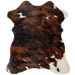 Tricolor Mini Cowhide:  has a brown and black, brindle pattern, with a few small, white spots, and white on the two right shanks - 2'8" x 2'3" (MINI232)
