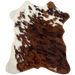 Tricolor Mini Cowhide:  has a brown and black, brindle pattern covering most of the hide, and white with spots that are a mix of brown and black, along the left and top edges - 2'8" x 2'3" (MINI237)
