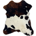 Tricolor Mini Cowhide:  has a black and brown, brindle pattern across the shoulder and along the lower edge, and white with black speckles and spots on the lower half - 2'8" x 2'3" (MINI250)