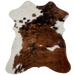Tricolor Mini Cowhide:  has a mix of brown and black covering most of the hide, white on the left side of the shoulder and down the left side edge, and a couple white spots on the right side - 2'8" x 2'3" (MINI252)