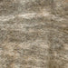 Closeup of this Brindle Mini Cowhide, showing light tan with black, brindle markings (MINI298)
