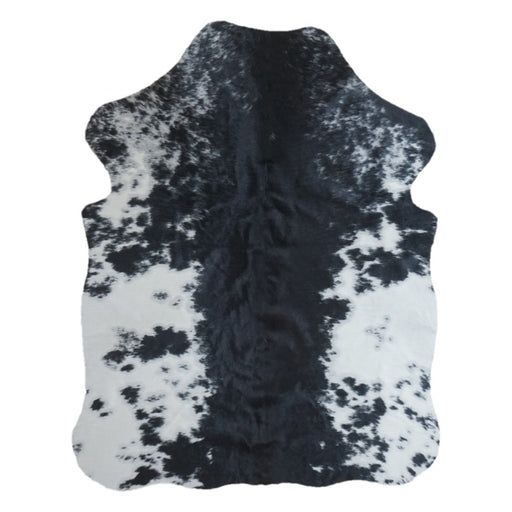 Black and White cowhide rug, 4' x 3', shown on white background (SS-BW-043)