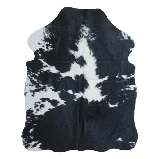 Black and White cowhide rug, 4' x 3', shown on white background (SS-BW-059)