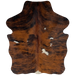 XS Tricolor Cowhide:  has a reddish brown and black brindle pattern, with a few small, white spots - 4'5" x 3'5" (XS320)