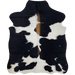 XS Black and White Cowhide: white with large, black spots, and brown down part of the spine - 4'4" x 3'5" (XS399)