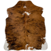 XS Tricolor Cowhide: has a brown and black, brindle pattern, and a few small, white spots down the middle and on the shanks and butt - 4'5" x 3'5" (XS518)