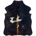 XS Dark Tricolor Cowhide: has a mix of black and dark reddish brown, a few small white spots with black speckles, and reddish brown down part of the spine - 4'5" x 3'4" (XS541)