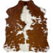 XS Reddish Brown and White Cowhide: reddish brown with small and large, white spots, and longer hair down the spine - 4'5" x 3'6" (XS544)