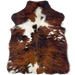 XS Tricolor Cowhide: has a reddish brown and black, brindle pattern with large and small, white spots, and longer hair down the middle of the shoulder - 4'5" x 3'3" (XS547)