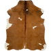 XS Brown and White Cowhide: brown with a few small, white spots, some black speckles on the shoulder, and dark reddish brown down the spine - 4'4" x 3'4" (XS550)