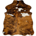 XS Tricolor Cowhide: has a brown and black, brindle pattern and large and small, white spots - 4'5" x 3'5" (XS591)