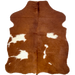 XS Reddish Brown and White Cowhide: has long hair that is reddish brown with white spots- 4'4" x 3'4" (XS601)