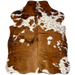 XS Two Tone Brown and White Cowhide: has a mix of medium brown and dark brown, and white spots that have medium brown and dark brown speckles - 4'5" x 3'5" (XS603)