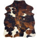 XS Tricolor Cowhide: has a mix of black and reddish brown, and a few small and large, off-white spots - 4'5" x 3'7" (XS606)