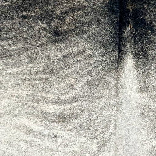 Closeup of this XS Brindle Cowhide, showing an ivory, gray, and black, brindle pattern (XS618)