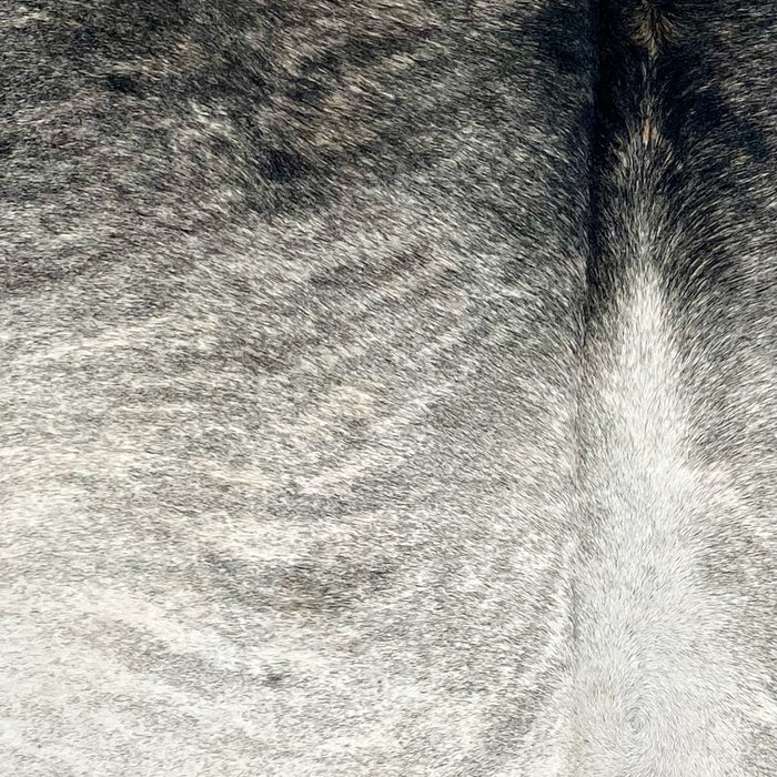 Closeup of this XS Brindle Cowhide, showing an ivory, gray, and black, brindle pattern (XS618)