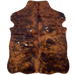 XS Red Brown and Black Cowhide: has long hair that is red brown and black with a few small, white spots - 4'5" x 3'5" (XS621)