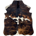 XS Tricolor Cowhide: has a brown and black, brindle pattern, and white spots across the middle and on the fore shanks - 4'4" x 3'5" (XS626)