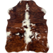XS Tricolor Cowhide: has long hair with a reddish brown and black, brindle pattern, small white spots, and white down the middle - 4'4" x 3'4" (XS631)