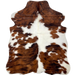 XS Tricolor Cowhide: white with large and small spots that have a brown and black, brindle pattern - 4'5" x 3'4" (XS634)
