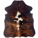 XS Tricolor Cowhide: has a reddish brown and black, brindle pattern and white and off-white spots down the middle - 4'5" x 3'4" (XS660)