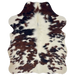 XS Tricolor Cowhide: white with brown and black spots, and long, off-white hair down the middle - 4'4" x 3'6" (XS679)