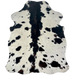 XS Ivory and Black Speckled Cowhide: ivory with black speckles and spots, and black and brown down the middle - 4'6" x 3'4" (XS696)