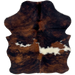 XS Tricolor Cowhide: has a mix of black and reddish brown, and a few white spots across the middle - 4'3" x 3'5" (XS723)