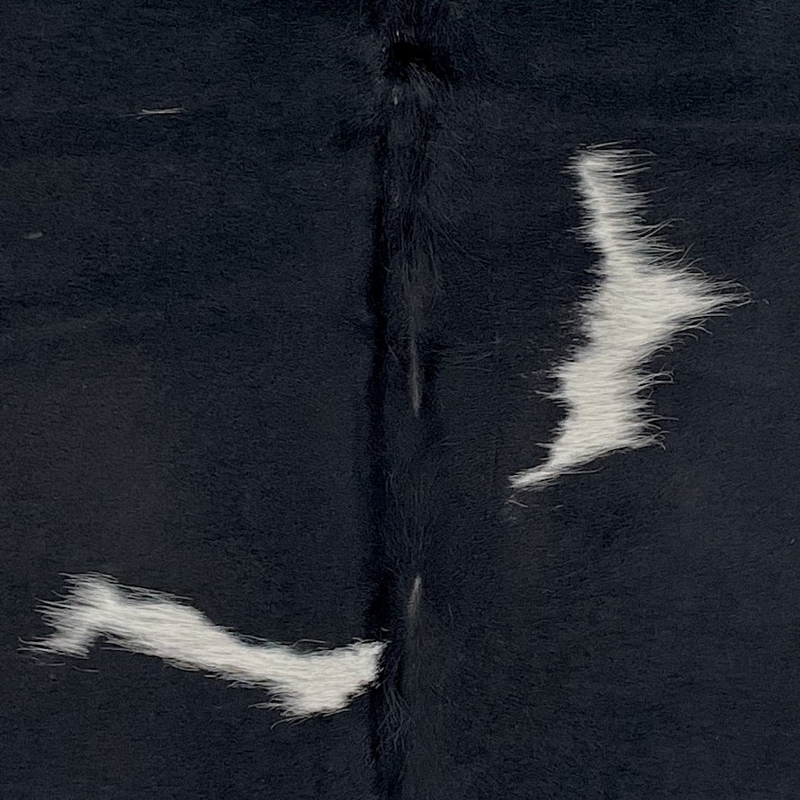 Closeup of this XS Cowhide: black with white spots (XS740)