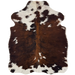 XS Tricolor Cowhide: has long hair that is reddish brown, black, and white - 4'5" x 3'4"  (XS765)