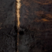 Closeup of this XS Brindle Cowhide, showing black with brown, brindle markings and light brown down the spine   (XS772)