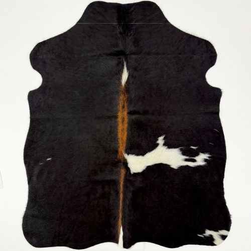 XS Black and White Cowhide:  black with a few white spots, and reddish brown down the spine, and longer hair down the middle of the shoulder - 4'4" x 3'5"  (XS777)