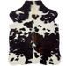XS Tricolor Cowhide: white and off-white with black spots and dark brown mixed in on some of the spots, and longer hair down the middle of the shoulder - 4'3" x 3'4" (XS781)
