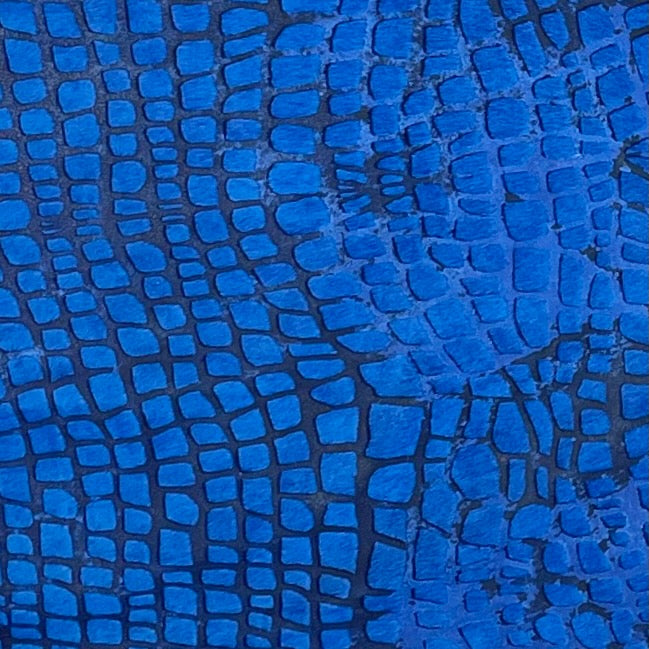 Closeup of this Brazilian, Dyed Blue Cowhide that has been treated with a Croc Acid Wash (BRAW343)