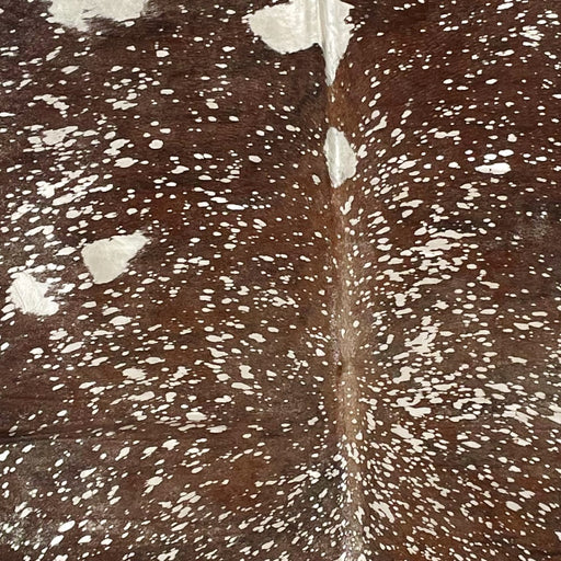 Closeup of this XL, Brazilian Cowhide, showing brown with a metallic, Champagne Acid Wash (BRAW365)