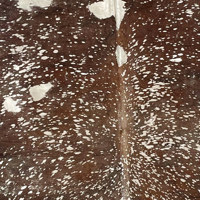 Closeup of this XL, Brazilian Cowhide, showing brown with a metallic, Champagne Acid Wash (BRAW365)