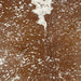 Closeup of this XL, Brazilian Cowhide, showing brown and white with a metallic, Silver Acid Wash (BRAW370)