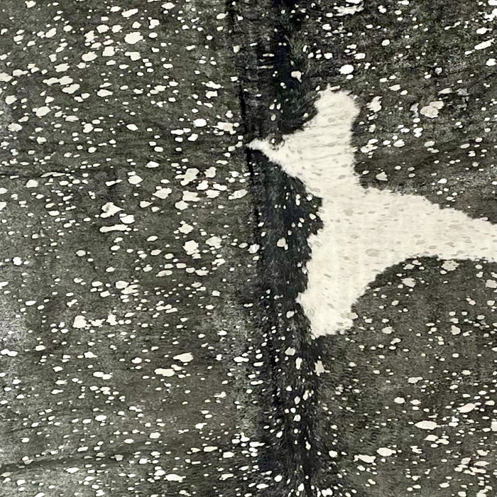 Closeup of this Large, Brazilian Cowhide, showing black and white, with a metallic, Silver Acid Wash (BRAW372)