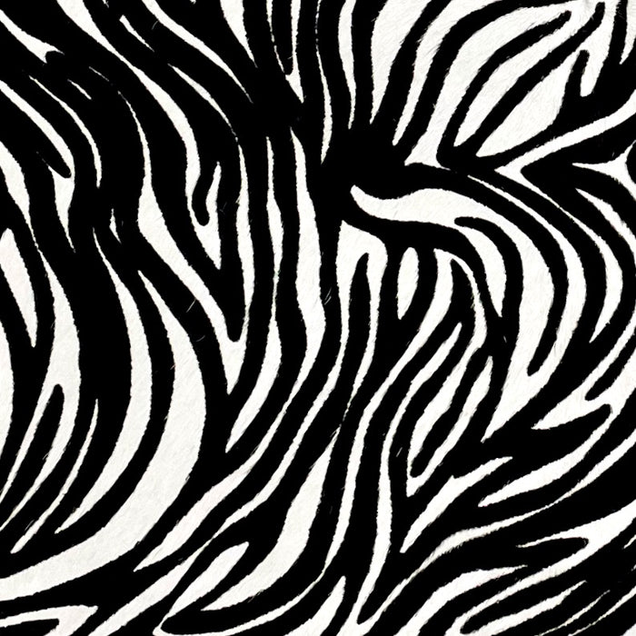 Closeup of this White, Brazilian Calfskin that has been stenciled with a Black, Baby Zebra Print (BRCALF489)