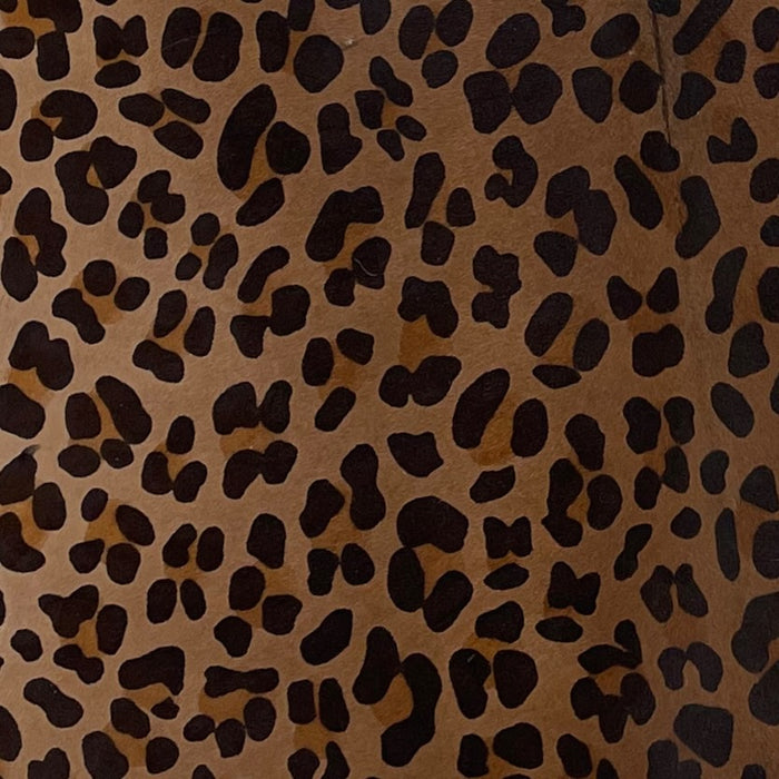 Closeup of this Dark Brown, Brazilian Calfskin, showing a stenciled, black and brown, Leopard Print (BRCALF551)