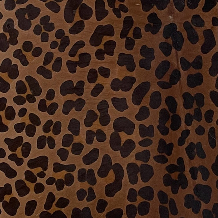 Closeup of this Dark Brown, Brazilian Calfskin, showing a black and brown, Leopard Print (BRCALF554)
