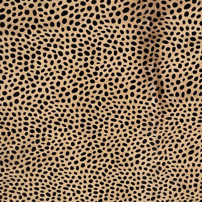 Closeup of this Light Brown, Brazilian Cowhide that has been stenciled with a Black, Cheetah Print (BRCH016)