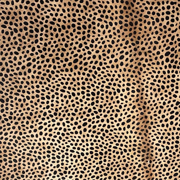 Closeup of this brown, Brazilian cowhide, showing a black cheetah print (BRCH018)