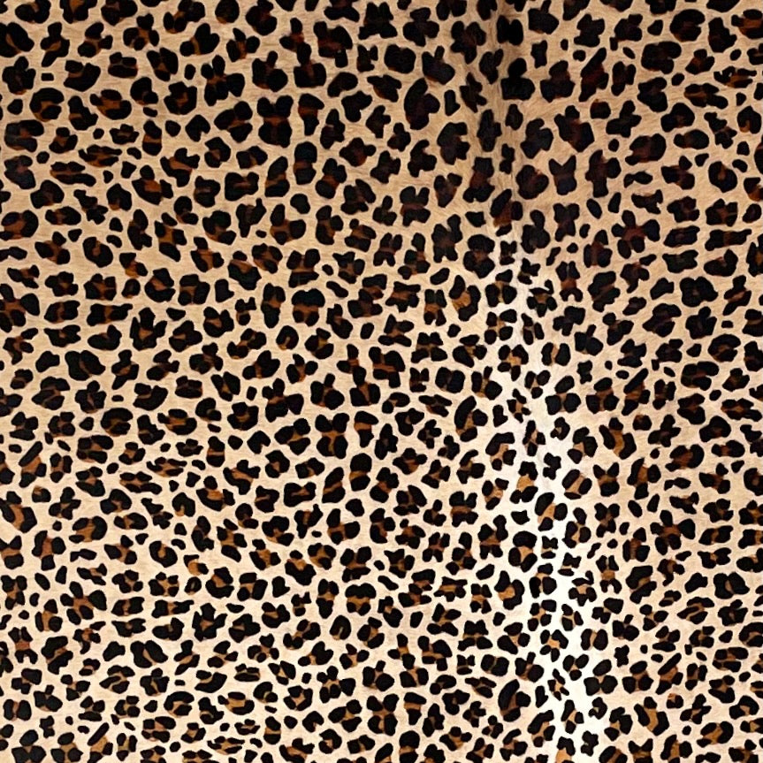 Closeup of this large, brown, Brazilian Cowhide, showing a brown and black, Leopard Print (BRLP069)