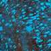 Closeup of this Dark Brown, Brazilian, Mini Cowhide that has been treated with a Blue, Metallic Acid Wash (BRMINIAW136)