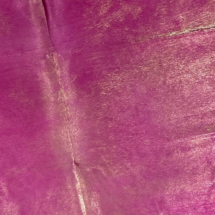 Closeup of this XL, Brazilian Cowhide, showing Dyed Pink with a light mist of Gold Spray (BRSLD189)