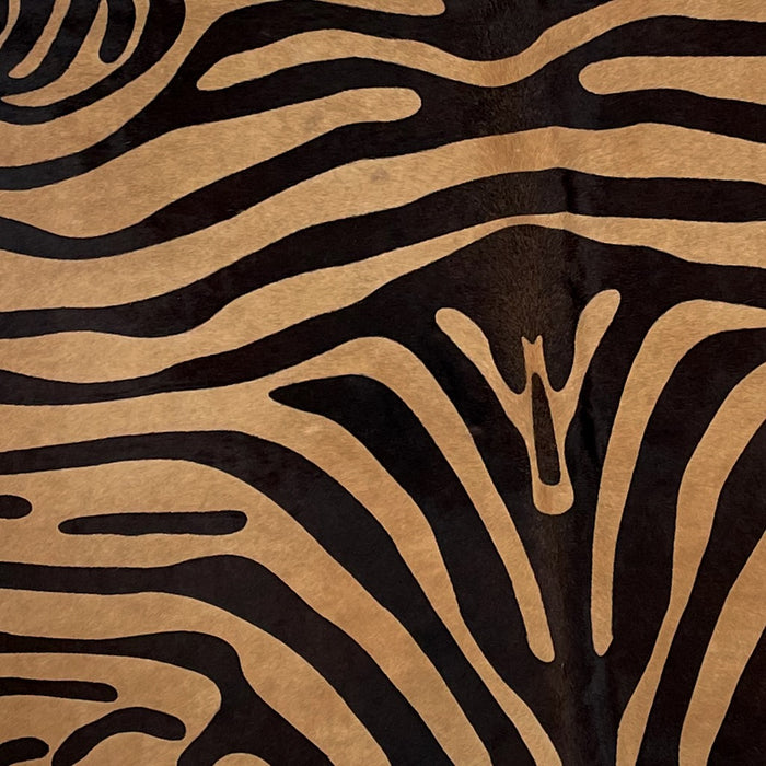 Closeup of this Light Brown, Brazilian Cowhide, showing a Black, Zebra Print (BRZP034)