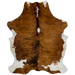 Colombian Tricolor Cowhide:  has a brown and black, brindle pattern, with four white spots on the spine, off-white on the belly, and white on the hind shanks - 6'2" x 4'5" (COTR781)